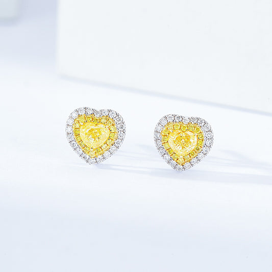 Heart Shaped Yellow Diamond Stud Earrings in White Gold