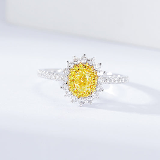 Oval Cut Pink Diamond Sunburst Ring with Pavé Setting
