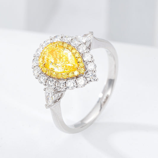 Pear Shaped Yellow Diamond Halo Engagement Ring with Three Stone Setting in 18K White Gold