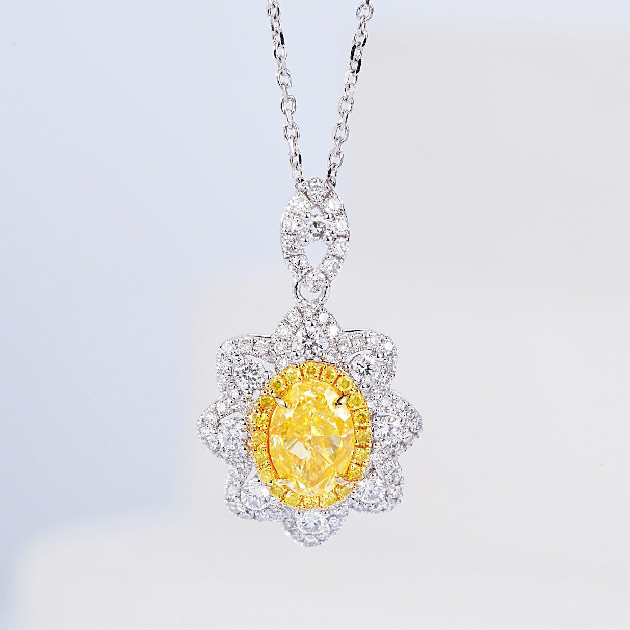 Oval Cut Yellow Diamond Pendant with Sunflower Diamond Halo -Front View