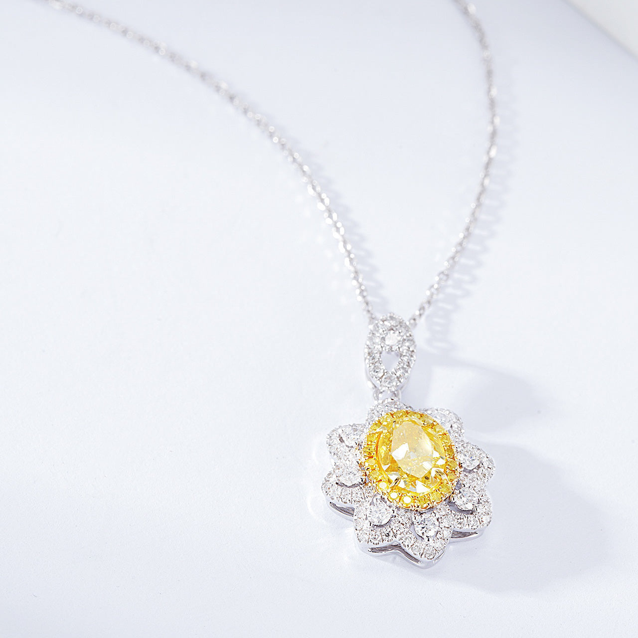 Oval Cut Yellow Diamond Pendant with Sunflower Diamond Halo -Top View