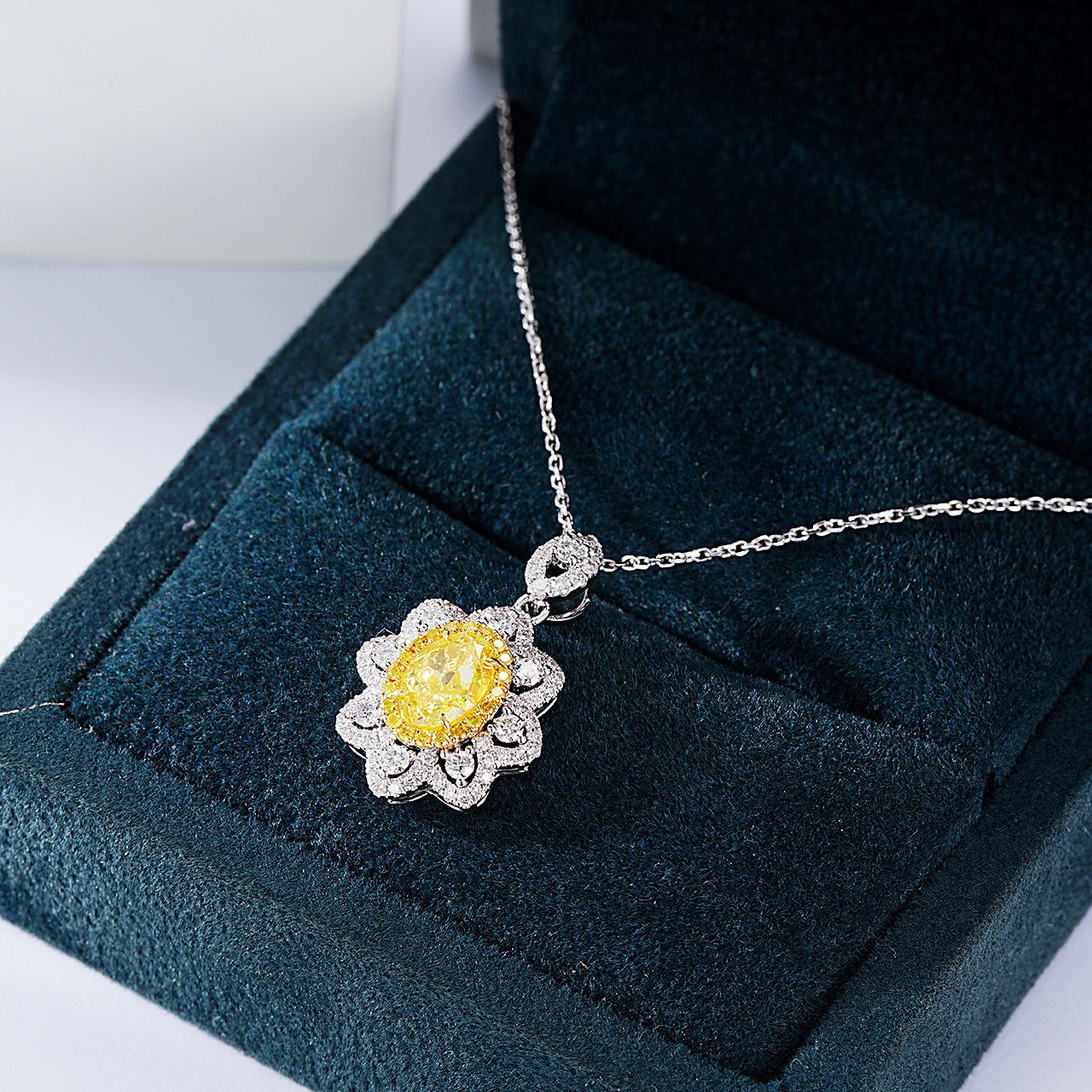 Oval Cut Yellow Diamond Pendant with Sunflower Diamond Halo -In-Box Display