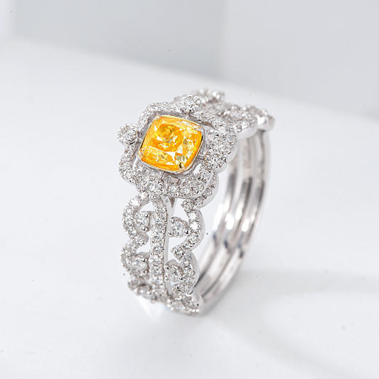 Cushion Cut Yellow Diamond Halo Ring with Interwoven Diamond Band