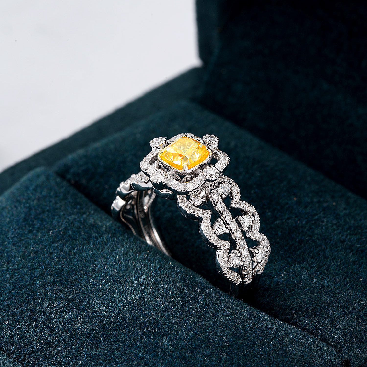 Cushion Cut Yellow Diamond Halo Ring with Interwoven Diamond Band -Perspective Close-up
