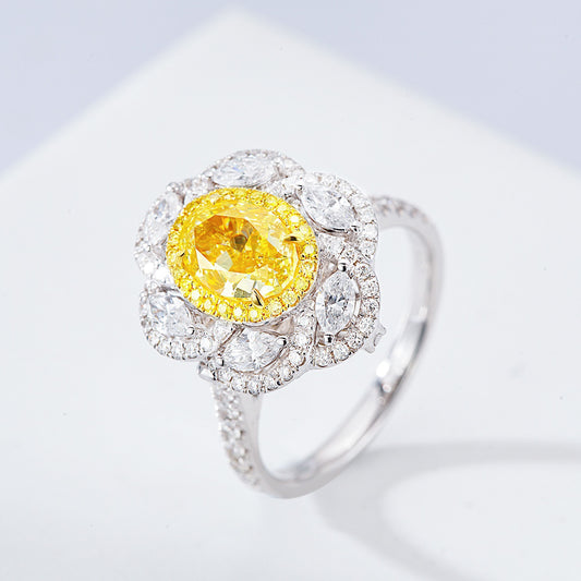 Oval Cut Yellow Diamond Halo Engagement Ring with with Marquise Accents