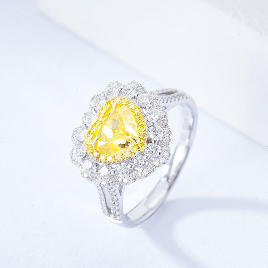 Heart Shaped Yellow Diamond Engagement Ring with Pavé Halo Setting