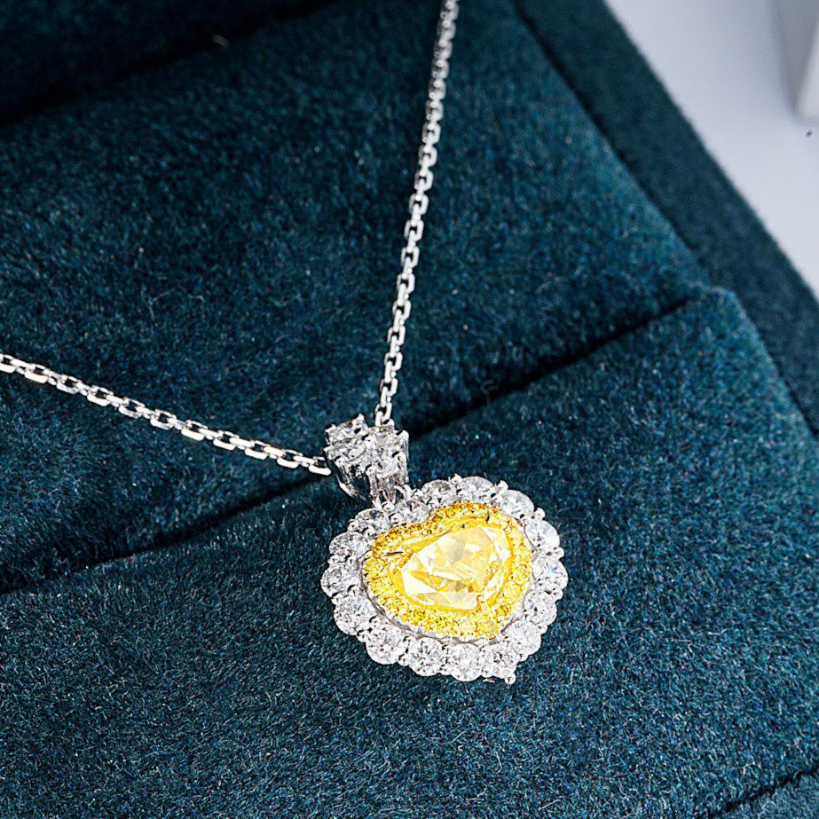 Heart Shaped Yellow Diamond Halo Pendant in 18K White Gold with Cable Chain -Perspective Close-up