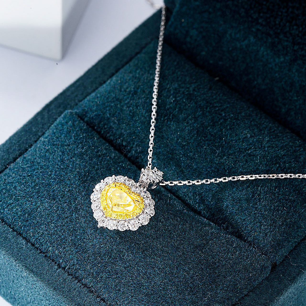 Heart Shaped Yellow Diamond Halo Pendant in 18K White Gold with Cable Chain -In-Box Display