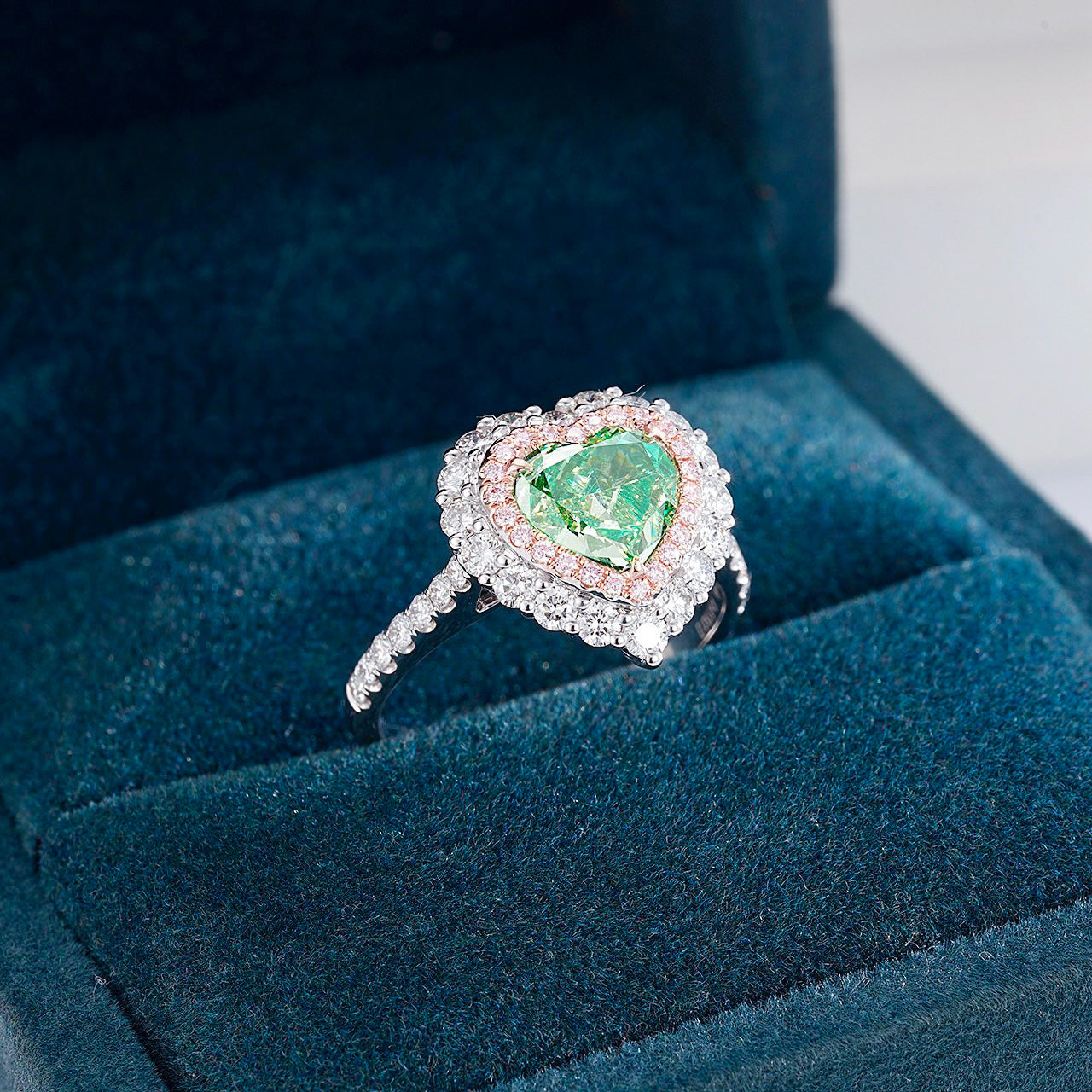 Heart Shaped Green Diamond Halo Engagement Ring with Pavé Setting -Perspective Close-up