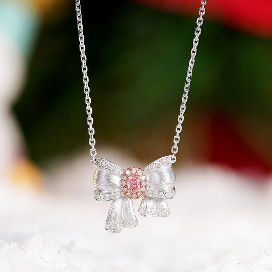 Pink Diamond Christmas Bow Pendant in 18K White Gold