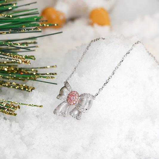 Pink Diamond Christmas Bow Pendant in 18K White Gold