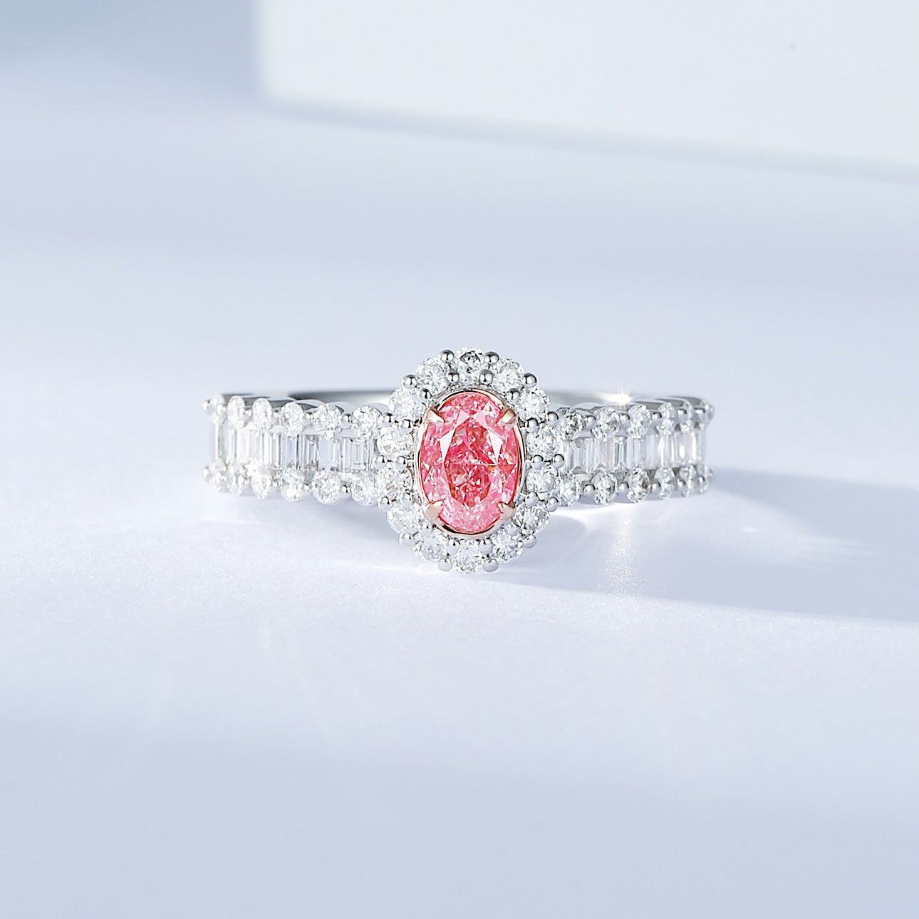 Oval Cut Pink Diamond Engagement Ring with Diamond Halo and Baguette Cut Band -Front View