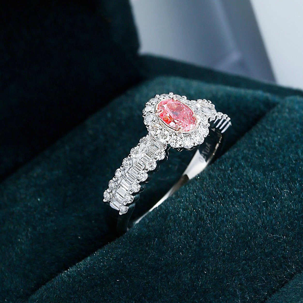 Oval Cut Pink Diamond Engagement Ring with Diamond Halo and Baguette Cut Band -Perspective Close-up