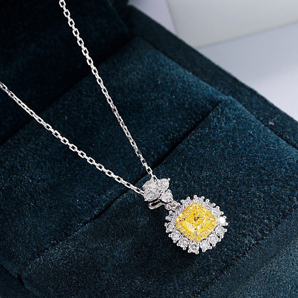 Cushion Cut Yellow Diamond Pendant with Sunflower Diamond Halo -Perspective Close-up