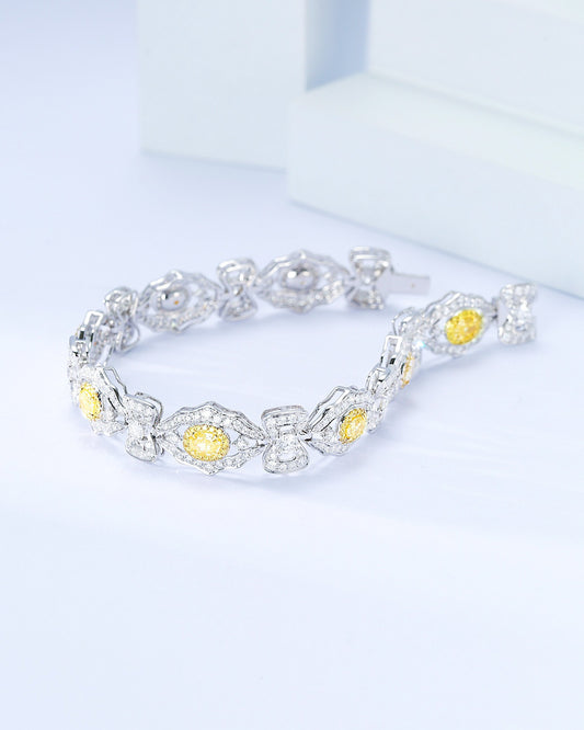 Oval Cut Yellow Diamond Station Designer Bracelet in 18K White Gold