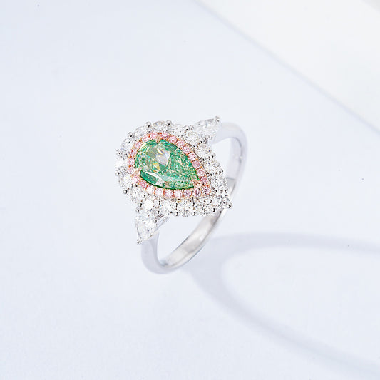 Pear Shaped Green Diamond Halo Engagement Ring with Three Stone Setting