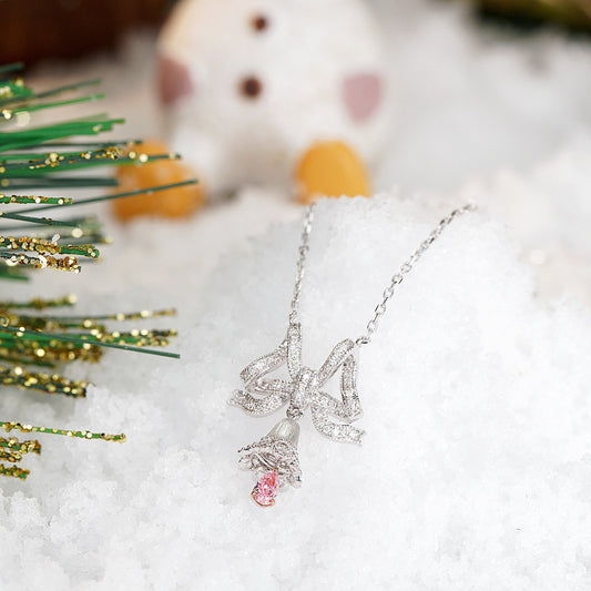 Christmas Pink Diamond Bell Pendant with Lace Bow in 18K White Gold