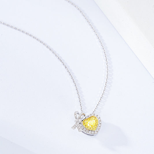 Heart Shaped Yellow Diamond Pendant in 18K White Gold