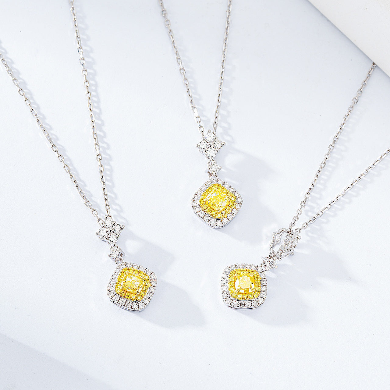 Cushion Cut Yellow Diamond Halo Pendant in 18K White Gold -Side Angle