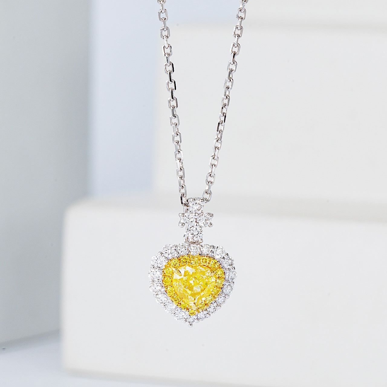 Heart Shaped Yellow Diamond Halo Pendant in 18K White Gold -Front View