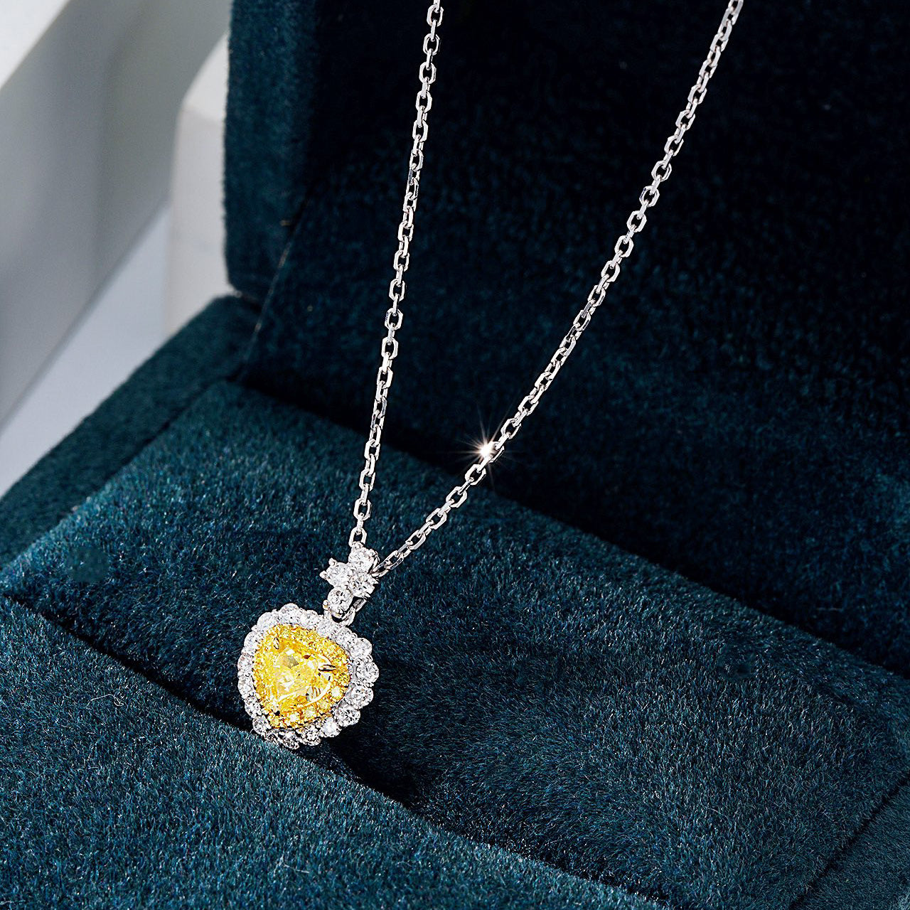 Heart Shaped Yellow Diamond Halo Pendant in 18K White Gold -In-Box Display