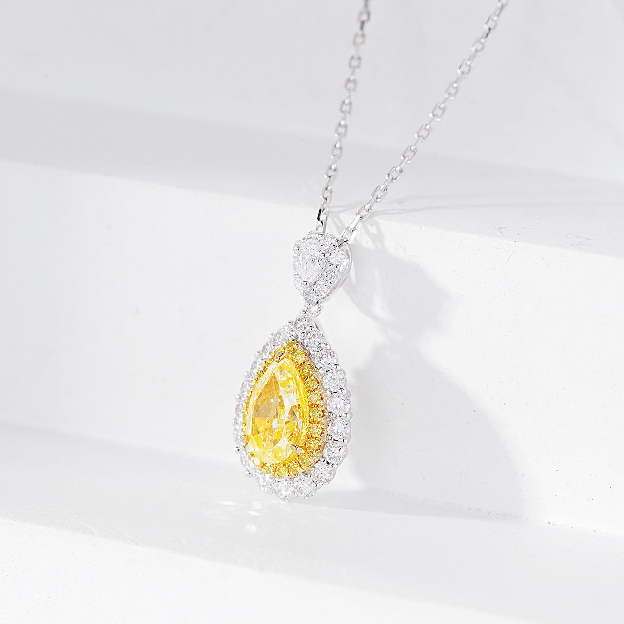Pear Shaped Yellow Diamond Halo Pendant with Full Diamond Setting -Top View