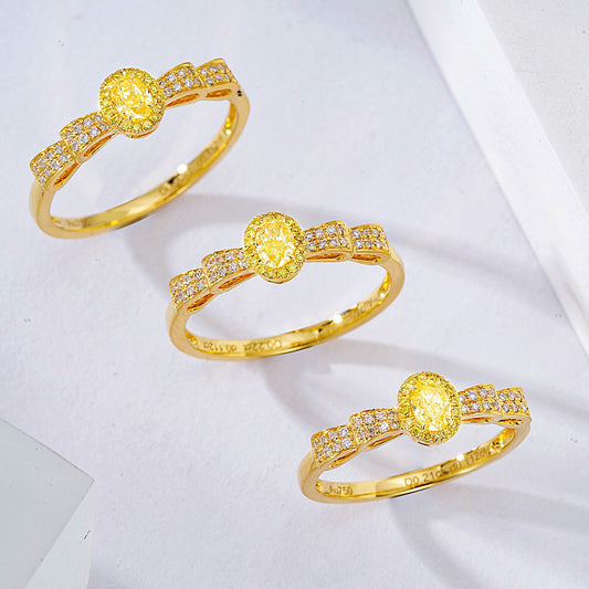 Oval Cut Yellow Diamond Vintage Engagement Ring in Yellow Gold