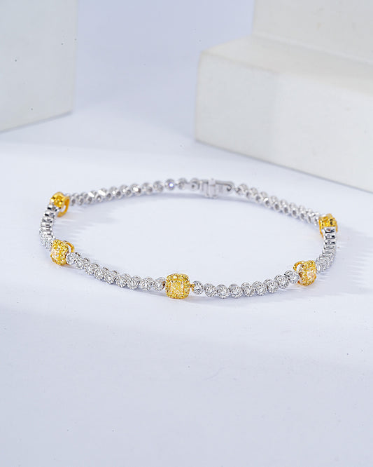 Cushion Cut Yellow Diamond Station Tennis Bracelet in 18K White Gold