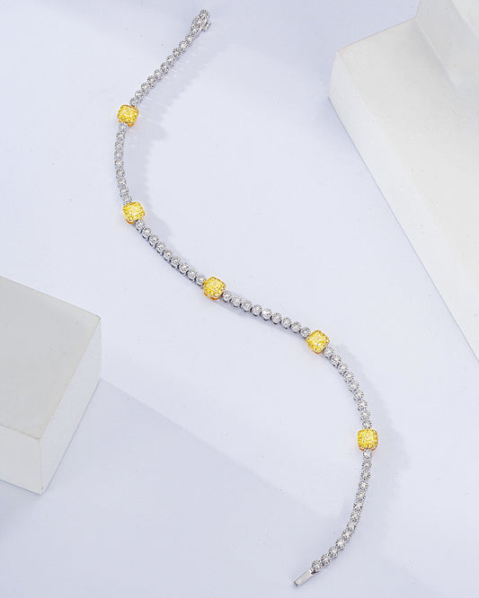 Cushion Cut Yellow Diamond Station Tennis Bracelet in 18K White Gold
