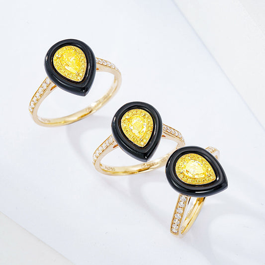 Pear Shaped Yellow Diamond Ring with Black Onyx Accent