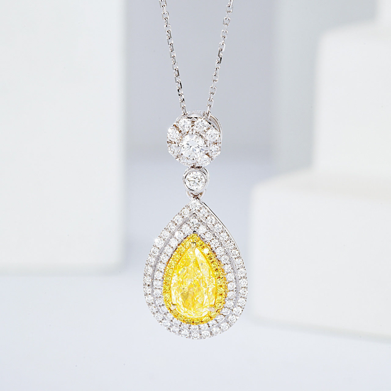 Pear Shaped Yellow Diamond Double Halo Pendant in 18K White Gold -Front View