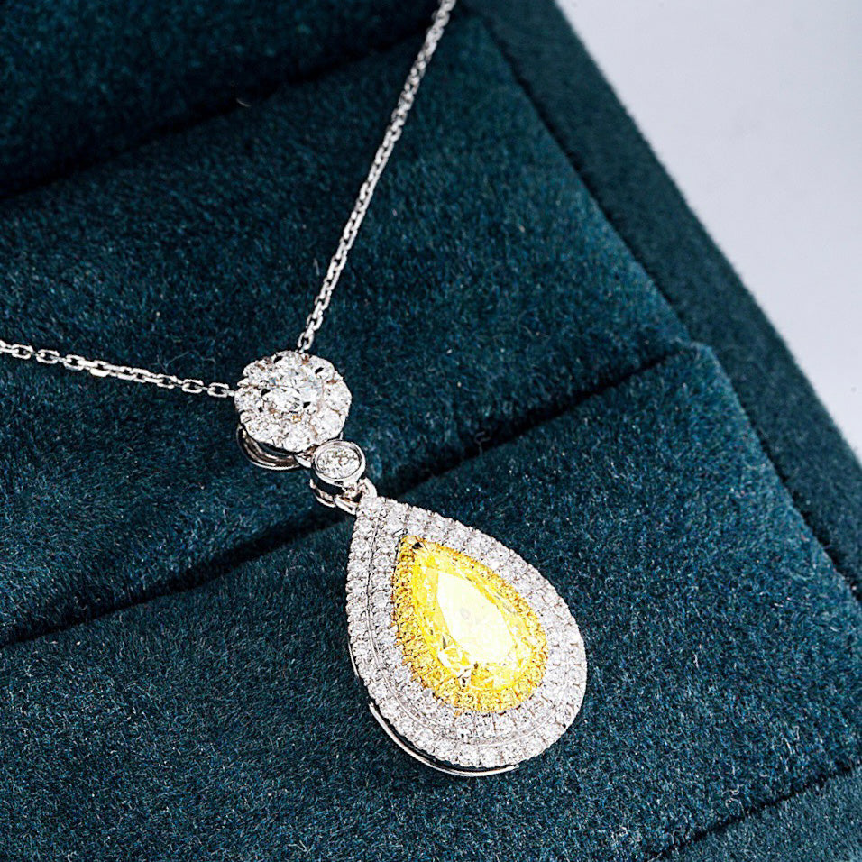 Pear Shaped Yellow Diamond Double Halo Pendant in 18K White Gold -Perspective Close-up