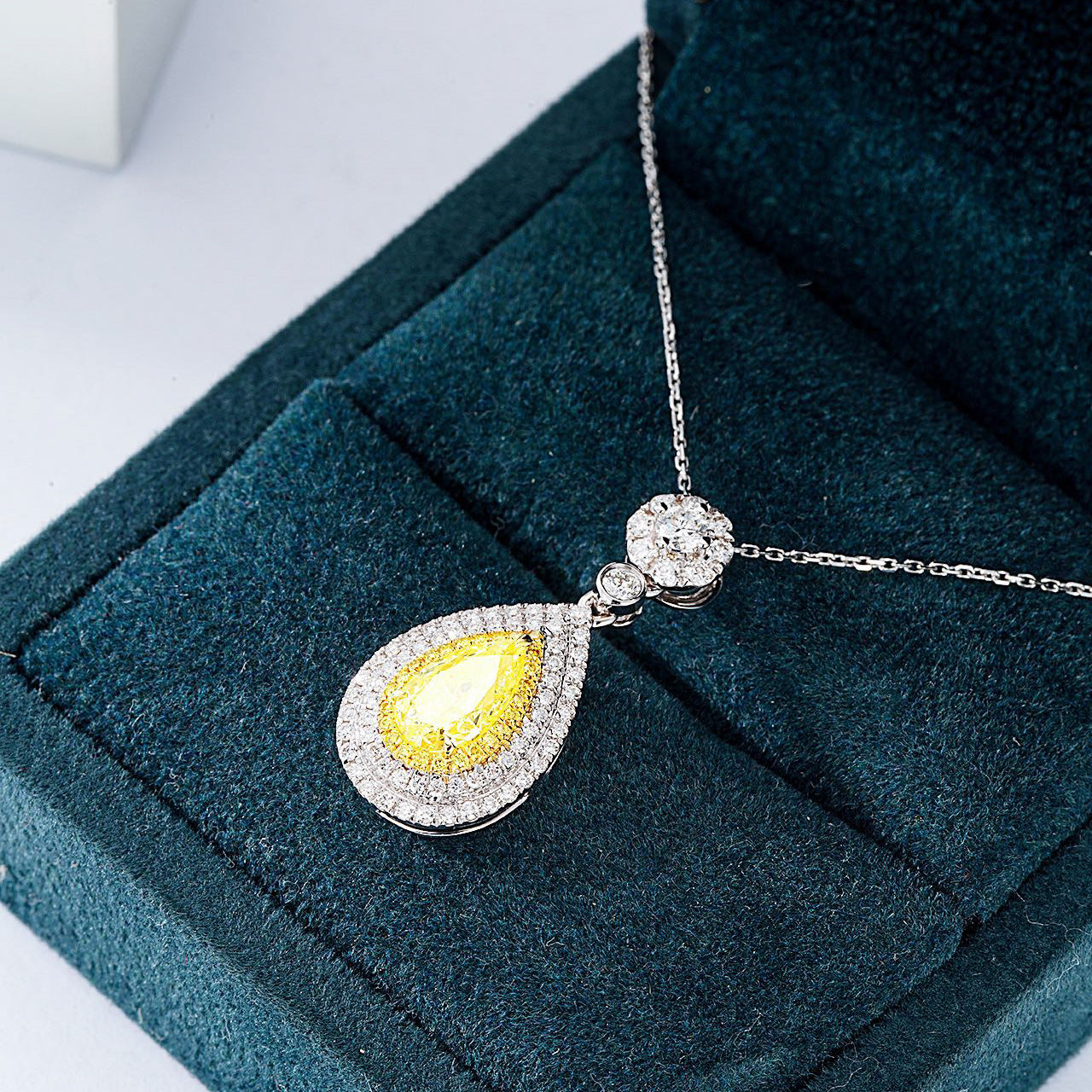 Pear Shaped Yellow Diamond Double Halo Pendant in 18K White Gold -In-Box Display