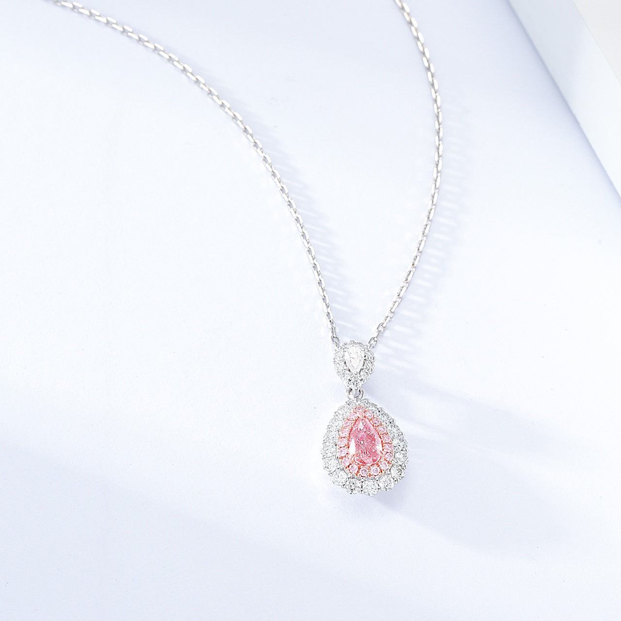 Pear Shaped Yellow Diamond Halo Pendant in 18K White Gold -Side Angle