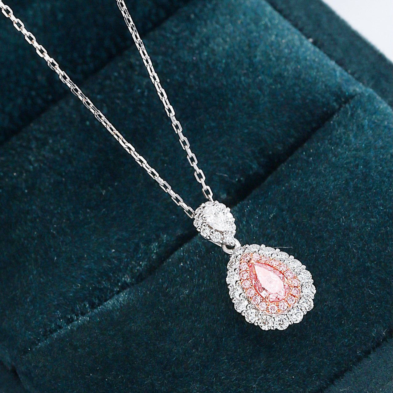 Pear Shaped Yellow Diamond Halo Pendant in 18K White Gold -Perspective Close-up