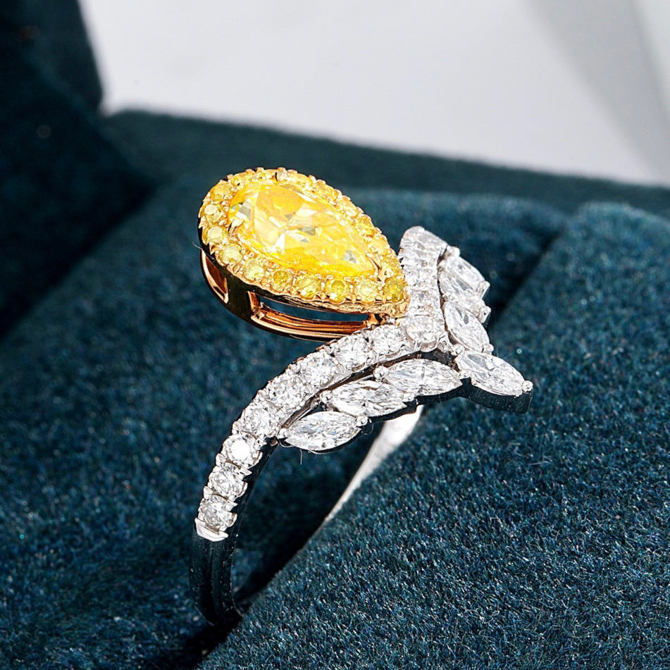 Pear-Shaped Yellow Diamond Halo Engagement Ring with V Shaped Diamond Band -Perspective Close-up