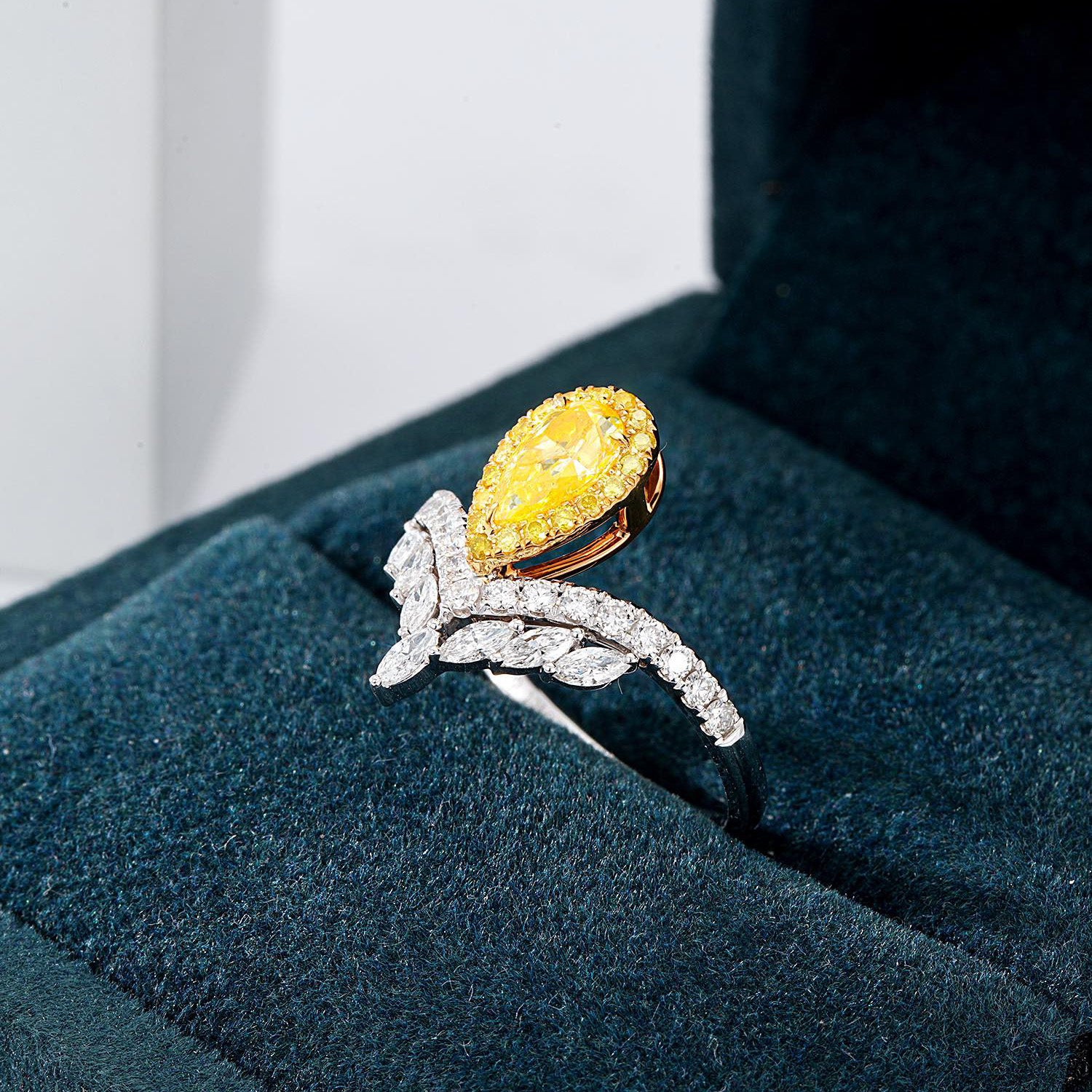 Pear-Shaped Yellow Diamond Halo Engagement Ring with V Shaped Diamond Band -In-Box Display