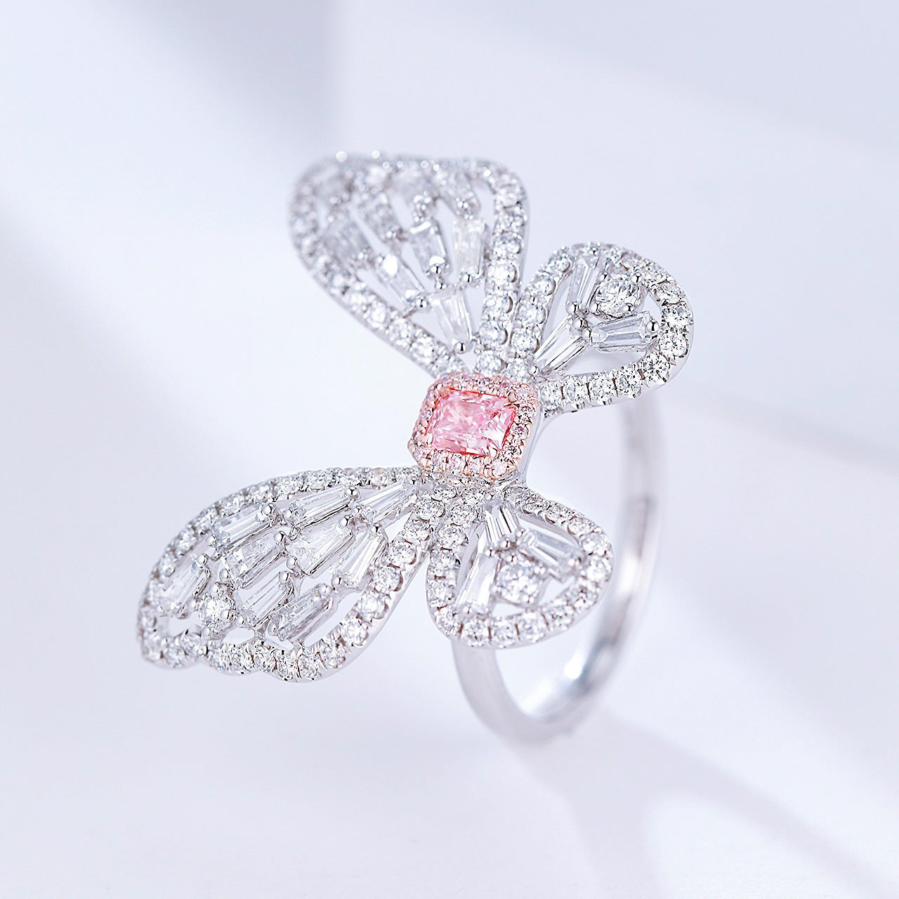 Radiant Cut Pink Diamond Butterfly Ring in Elegant Diamond Setting -Side Angle