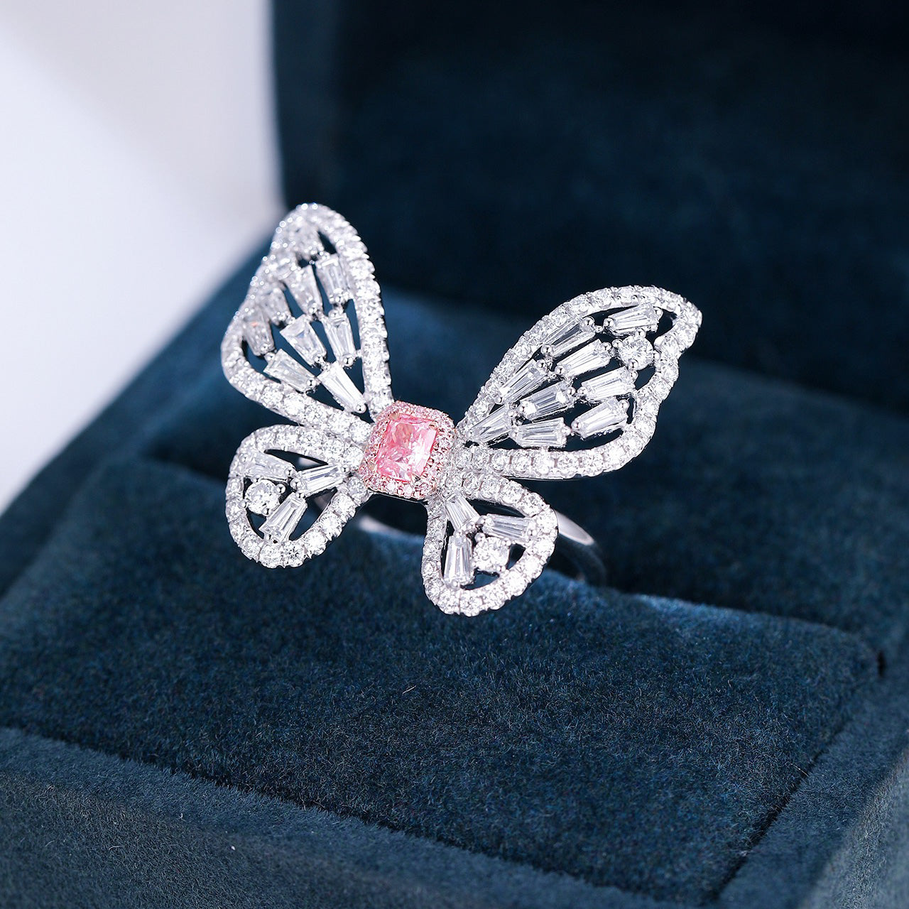 Radiant Cut Pink Diamond Butterfly Ring in Elegant Diamond Setting -In-Box Display