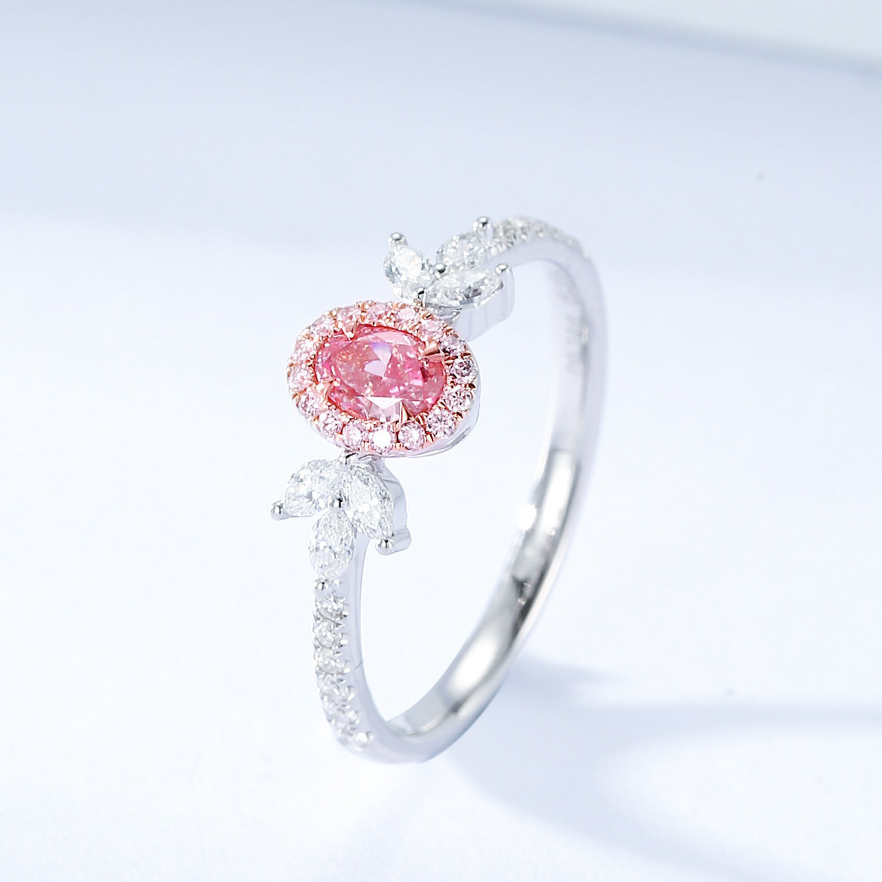 Oval Shaped Pink Diamond Ring with Nature Inspired Leaf Accents -Side Angle