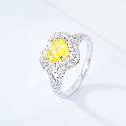 Heart Shaped Yellow Diamond Engagement Ring with Pavé and Halo Setting