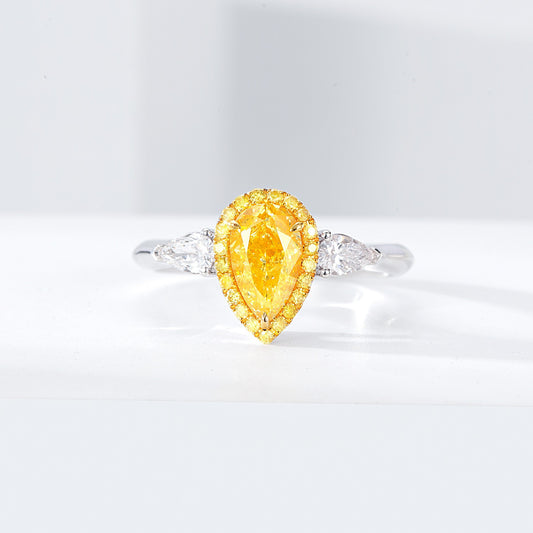 Three Stone Pear Shaped Yellow Diamond Engagement Ring in 18K White Gold