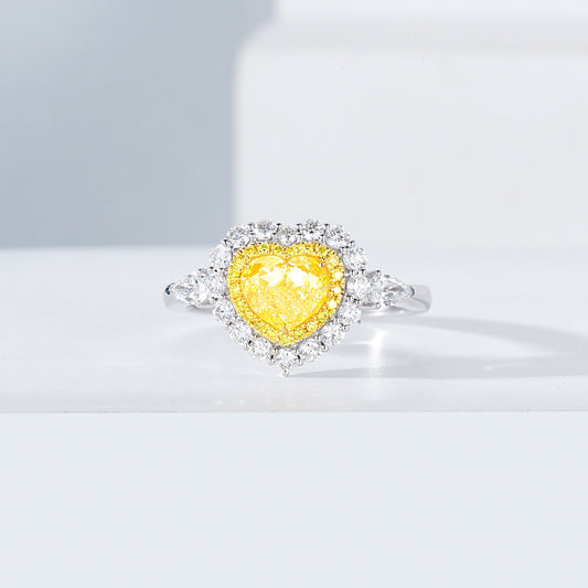 Heart Shaped Yellow Diamond Halo Engagement Ring with Three Stone Setting