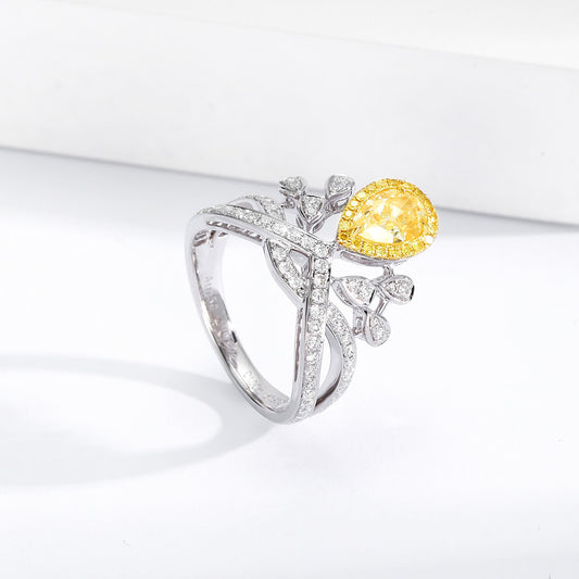 Pear Shaped Yellow Diamond Ring with Elegant Crown Design