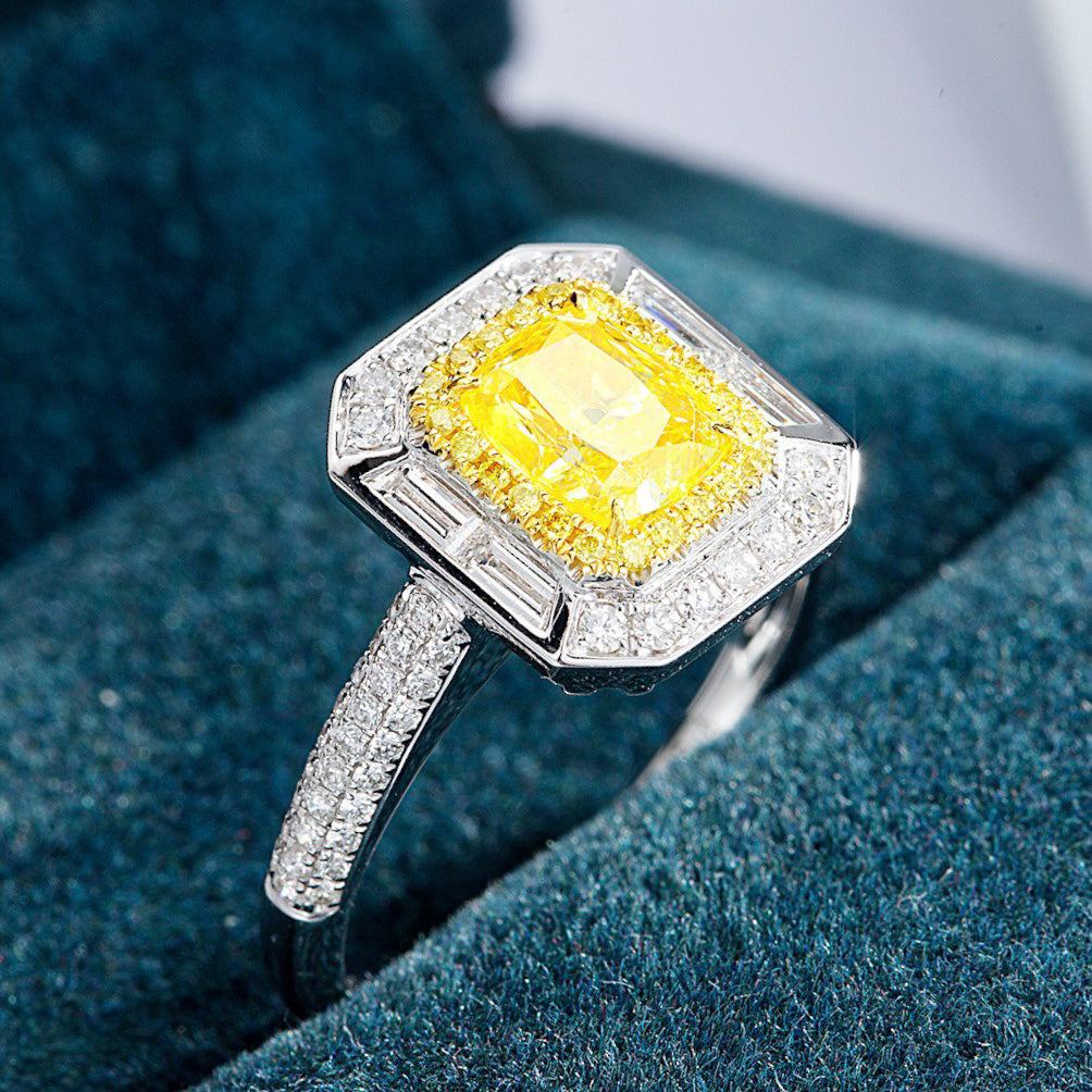 Cushion Cut Yellow Diamond Engagement Ring with Double Halo and Baguette Accents -Perspective Close-up