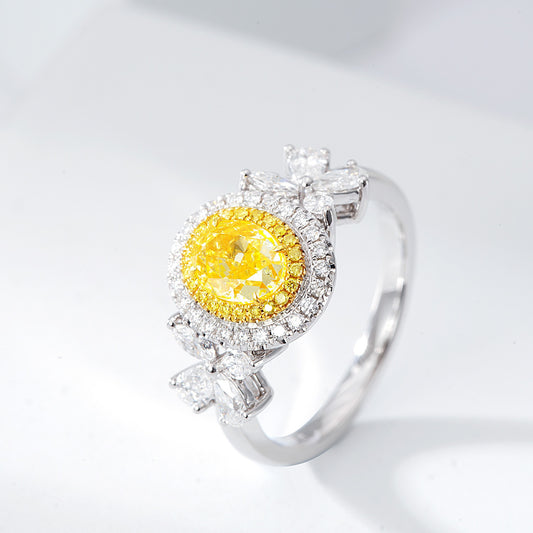 Oval Cut Yellow Diamond Halo Engagement Ring with Pear & Marquise Shaped Side Stones in 18K White Gold
