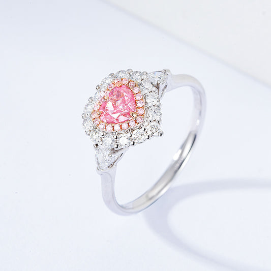 Heart Shaped Pink Diamond Halo Engagement Ring with Three Stone Setting in 18K White Gold