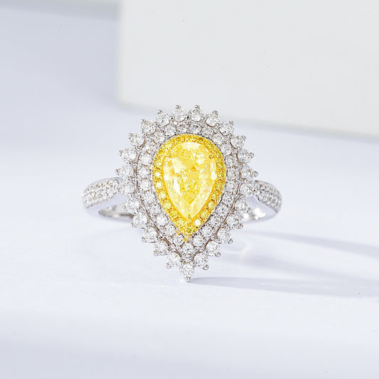 Pear Shaped Yellow Diamond Sunburst Halo Engagement Ring in 18K White Gold