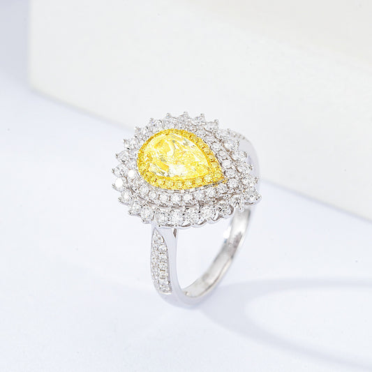 Pear Shaped Yellow Diamond Sunburst Halo Engagement Ring in 18K White Gold