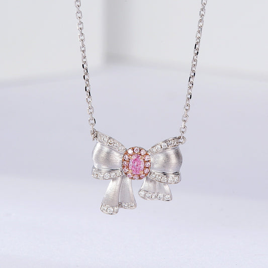 Oval Cut Pink Diamond Pendant with Butterfly Bow Design in 18K White Gold